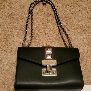 Used 1x MK studded bag